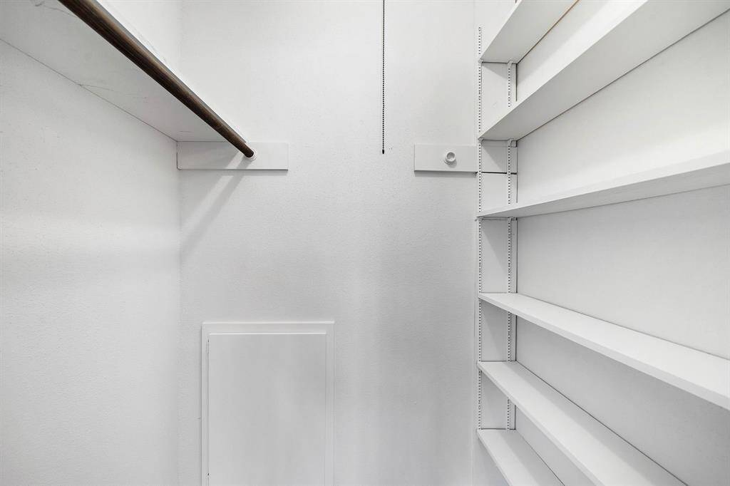 Walk-in closet with built-in shelves.*pic from the previous listing