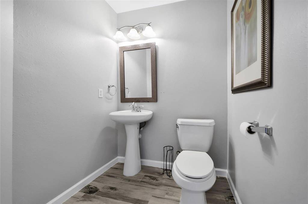 Half bath located downstairs.