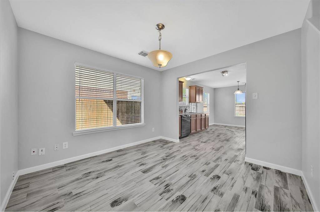 Enjoy a breakfast area next to the kitchen, separate from dining.