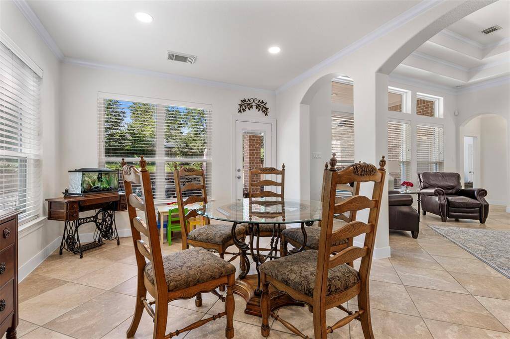 Breakfast area located just off of the kitchen and overlooking the backyard