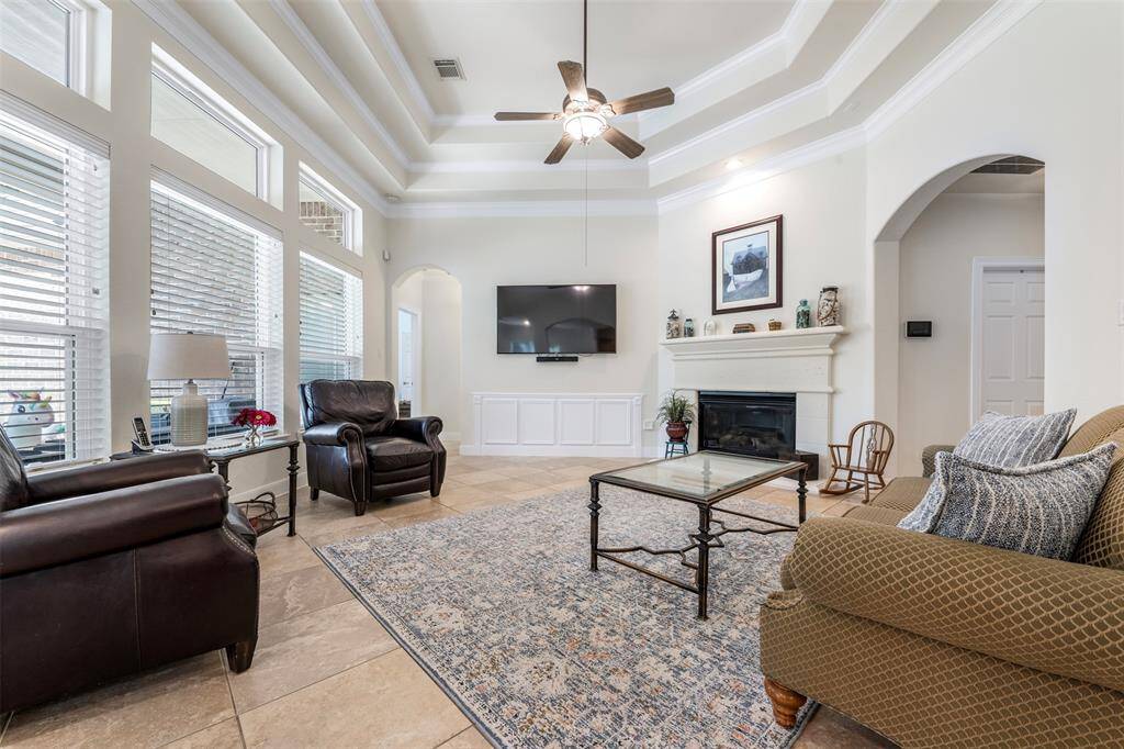View of living room from the kitchen with tons of natural light