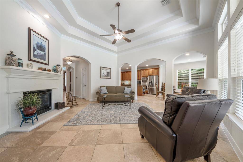 This living room is a lovely place to relax and also has plenty of room for all of your family gatherings