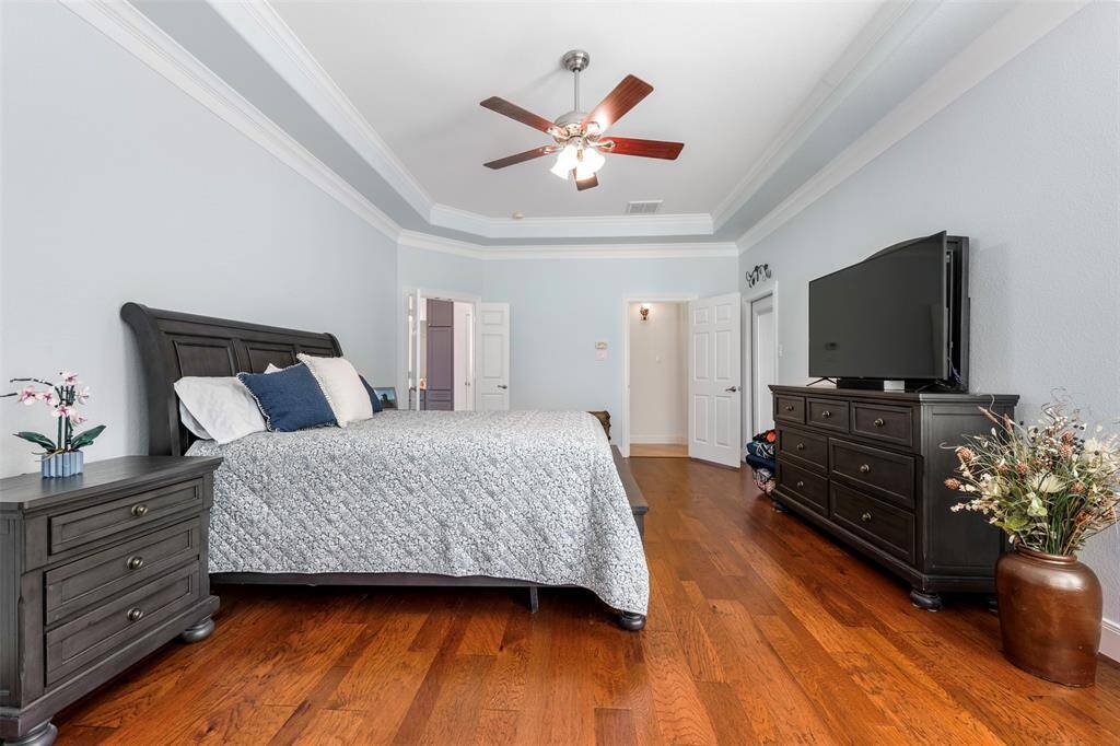 Another view of the primary bedroom