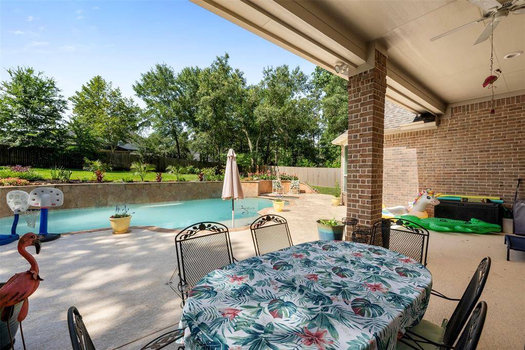 Covered patio with ceiling fans...a great spot for shaded relaxation.