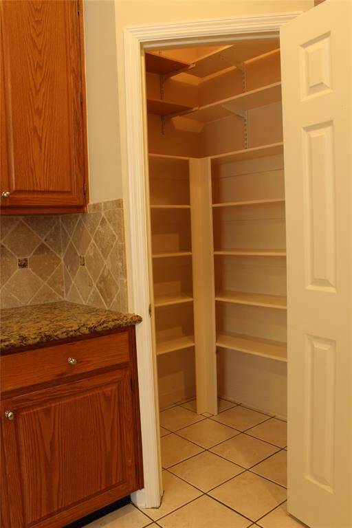 Big walk-in pantry by kitchen
