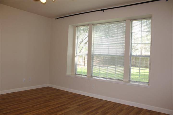 Master bedroom with big bright window