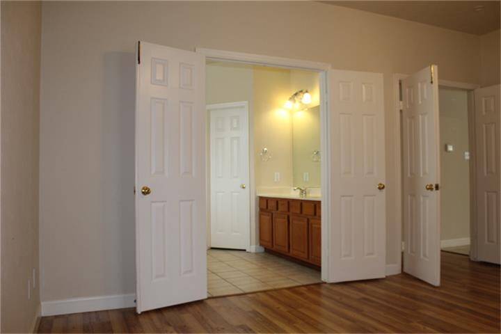Mater bedroom overlooking master bathroom