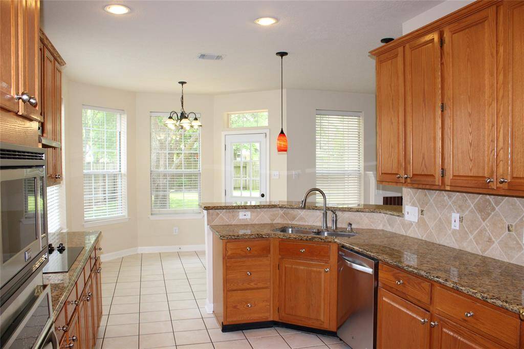 Kitchen open to breakfast area