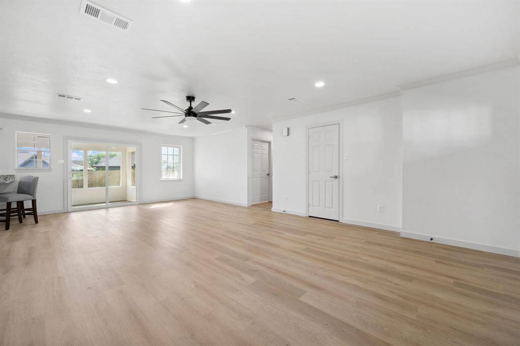A view of the living room from outside the primary bedroom