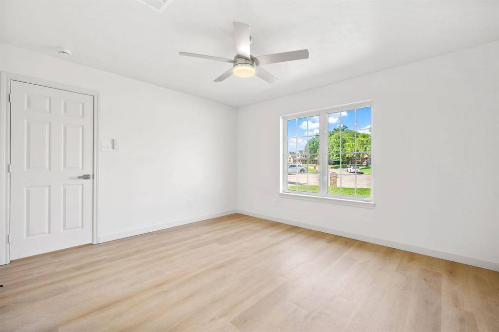 The primary suite is on the front of the home and separate from the other bedrooms for added privacy
