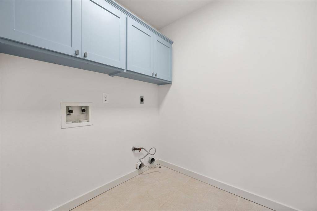 Laundry room is conveniently located just inside the entry door from the garage
