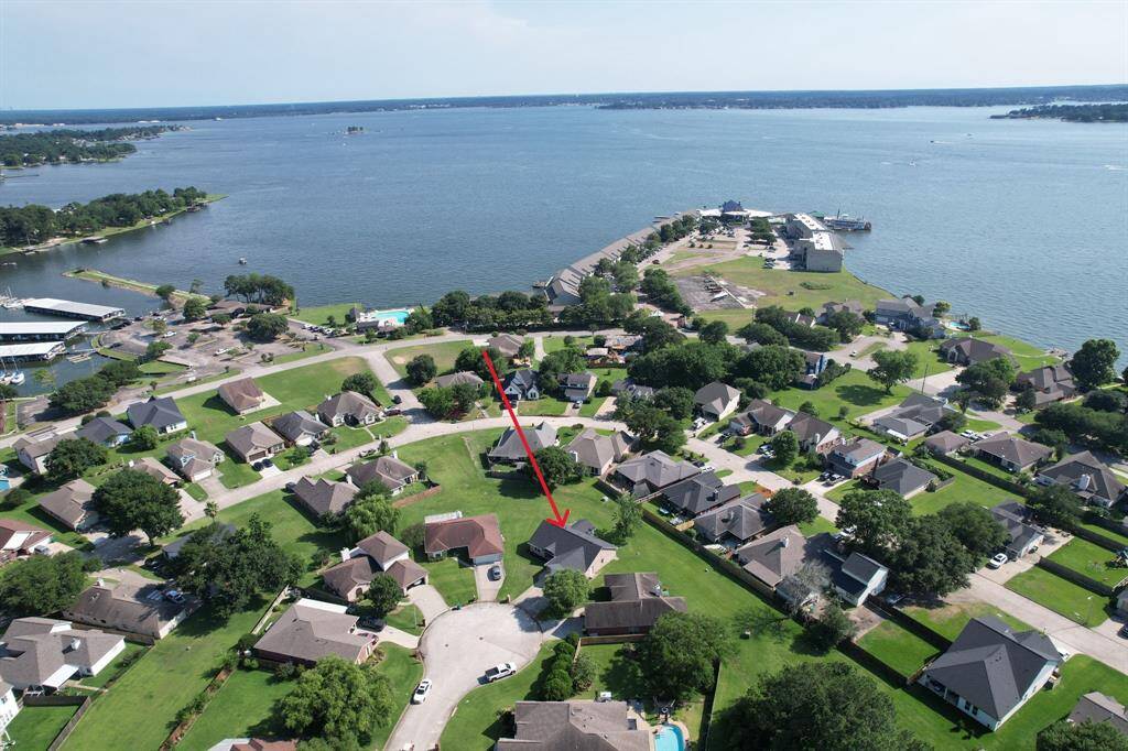Seven Coves Association owns the greenbelt behind the home, including the space at the end of Harbor View Road, which preserves your lake view and direct access