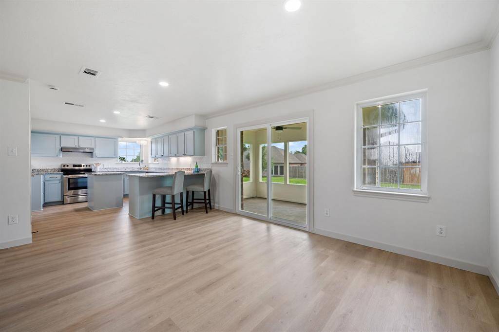 Dining, kitchen, and screened in porch are well connected