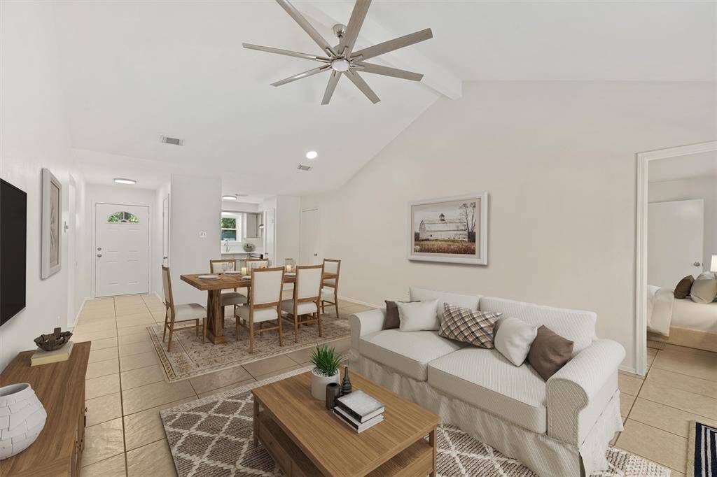 The possibilities are endless with how you can set up your furniture in this open concept with Living Room and Breakfast Room.