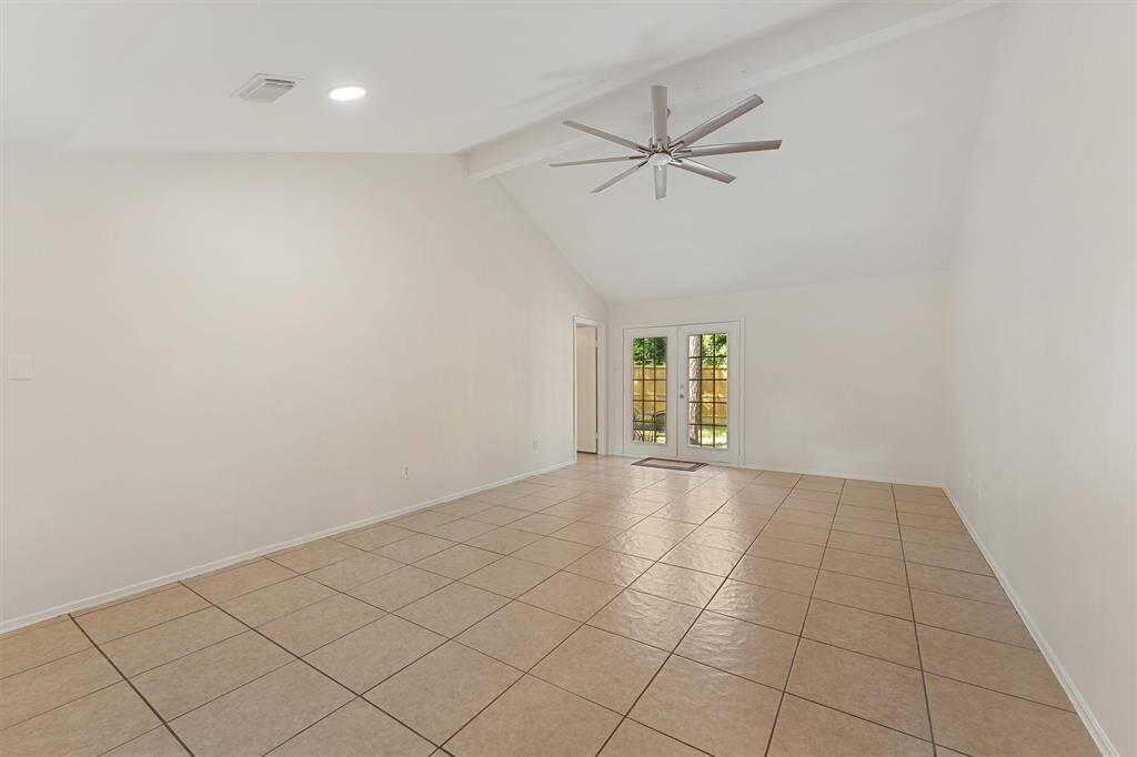 Living Room has access to the backyard.