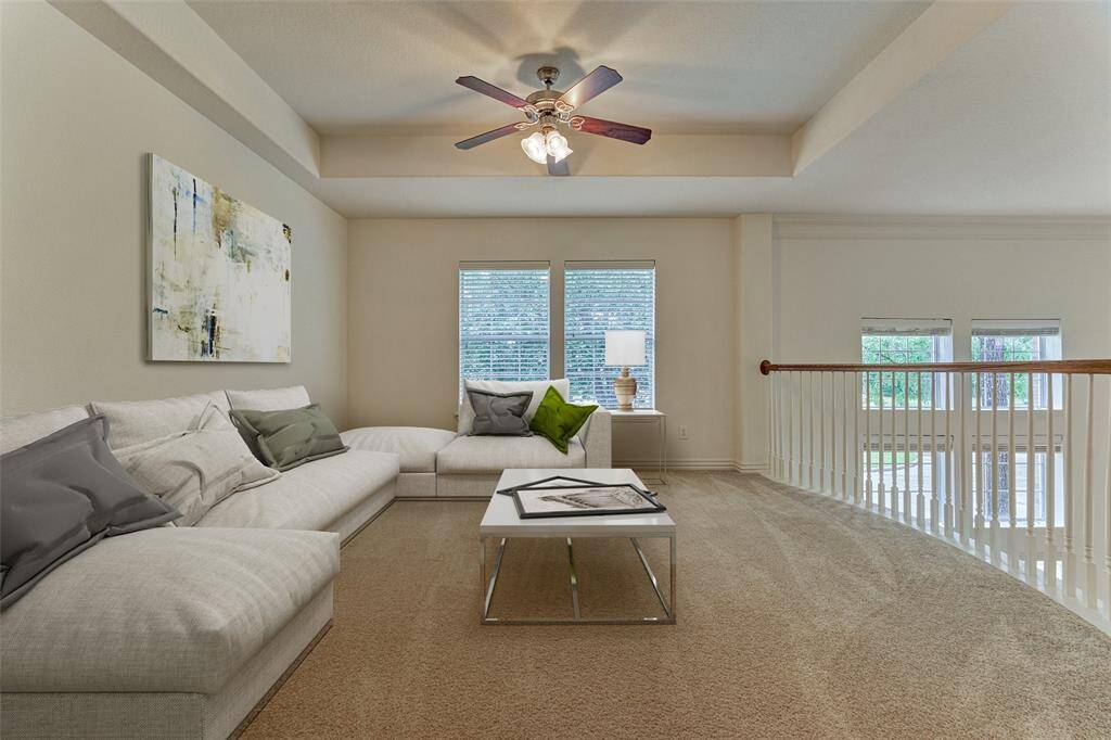 Upstairs game room virtually staged.