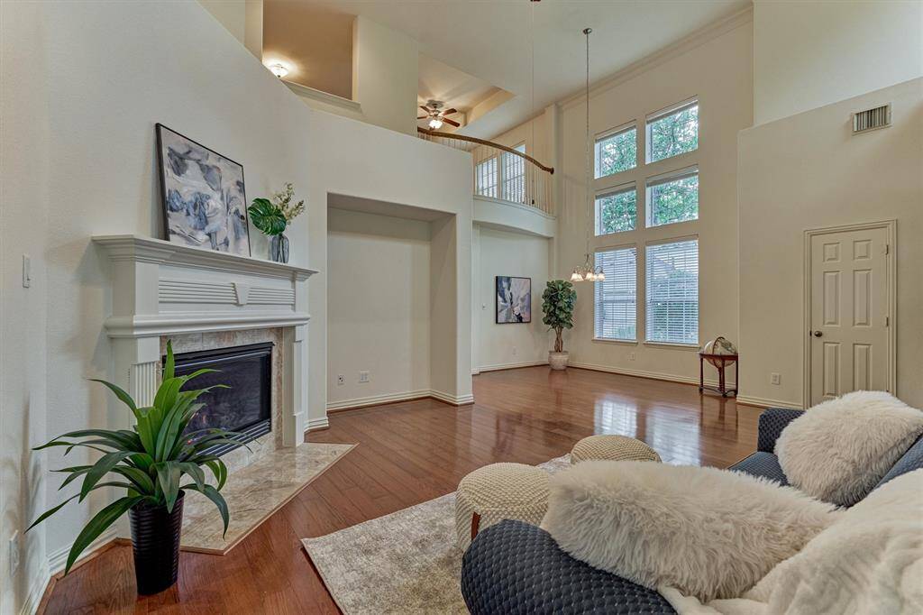 Dramatic two-story living and dining areas, Princess balcony, and a stunning wall of windows sets the stage.