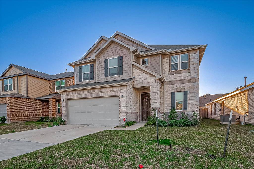 Be welcomed home by outstanding curb appeal, featuring a timeless stone and brick exterior paired with a spacious 2-car attached garage. Conveniently located near the neighborhood pool, this home offers the perfect blend of comfortable living and easy access to community amenities, schools, shopping, dining, and more.