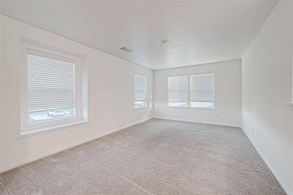 It's all fun and games with this supersized game room! What a great spot for summer slumber parties and rowdy family game nights.