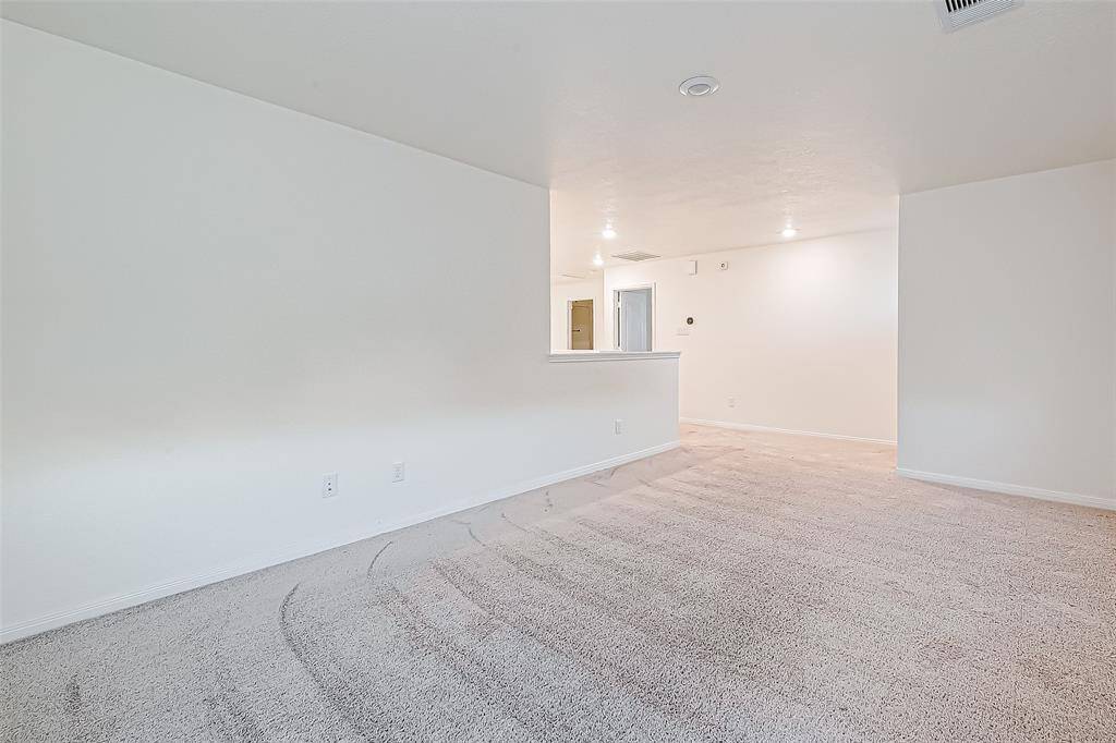 This spacious game room is ready for pool or card table, the big screen and more. You'll enjoy countless hours of laughs and giggles in this great space.