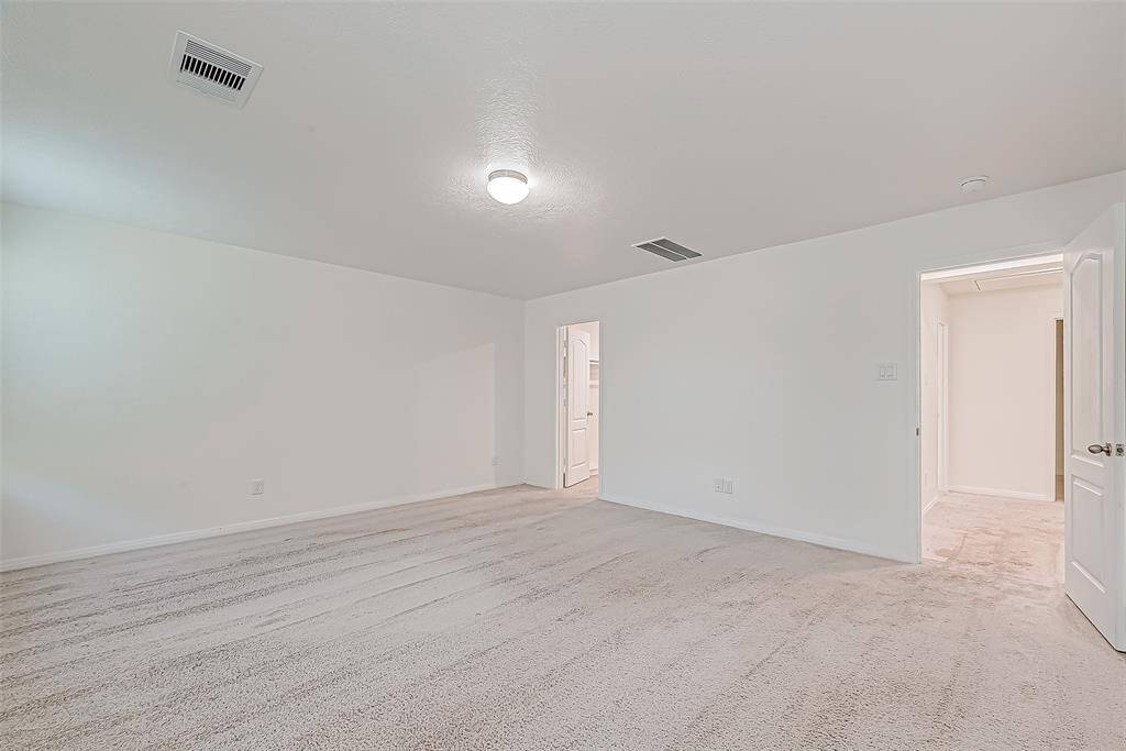 You’ll have sweet dreams in this oversized owner’s suite, with room for a California King and all your favorite furnishings. Soft carpeting, neutral tones, a private ensuite bath, and a huge walk-in closet make it the perfect place to relax and recharge.