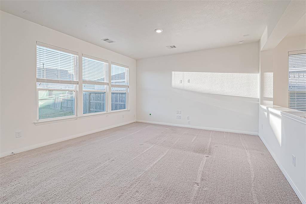 Imagine the sounds of chatter and laughter as you create memories of a lifetime with the people you love. This wonderful family room is the perfect place to do just that.