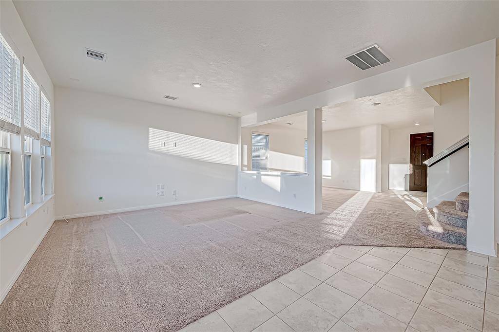 This lovely family room is a great space to gather and visit with your friends and family or enjoy a quiet, peaceful evening at home with your favorite person.