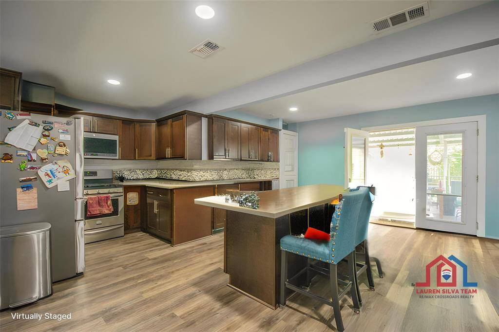 Open Layout to Completely Remodeled KitchenItems Virtually Removed