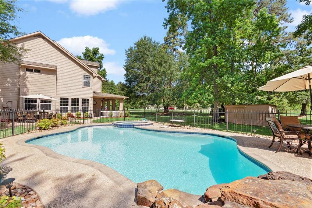 Imagine hosting family and friends in your beautiful pool with spa and safety fence.