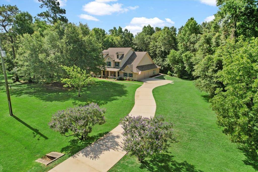 Beautiful property on corner lot with tons of mature trees.
