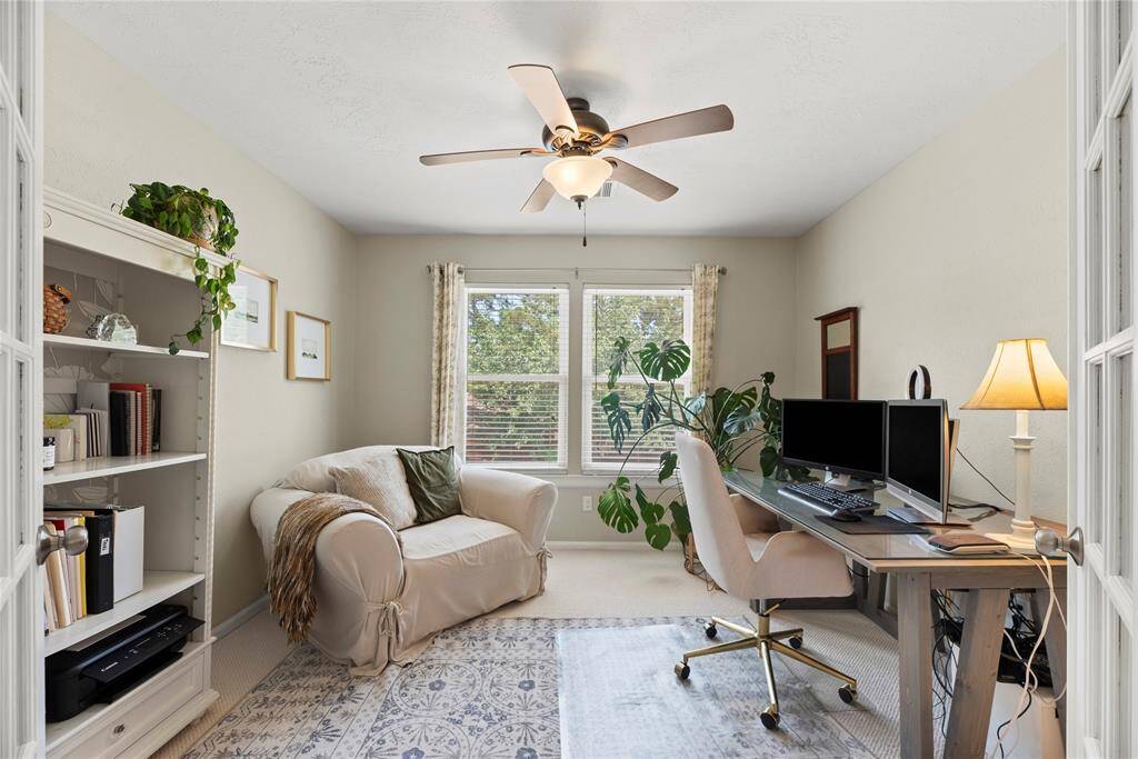 At the top of the stairs, a charming loft-style space awaits—ideal as a cozy sitting area, reading nook, or cheerful playroom to suit your needs.