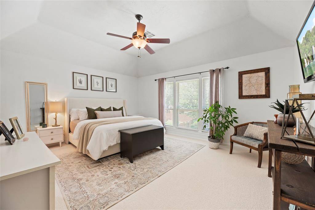 How perfect is this primary suite? Spacious and filled with natural light, this serene retreat offers the ultimate escape, promising comfort, tranquility, and pure relaxation.