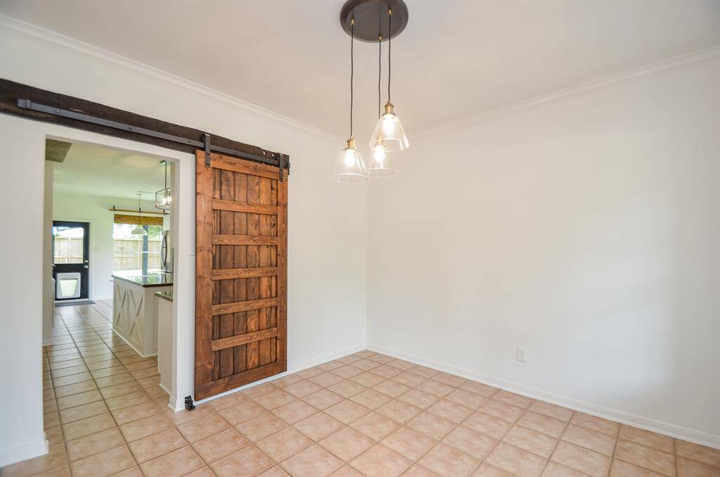 Formal dining room virtually staged.