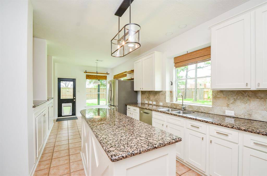 Laundry room. Washer and dryer stay with the home.