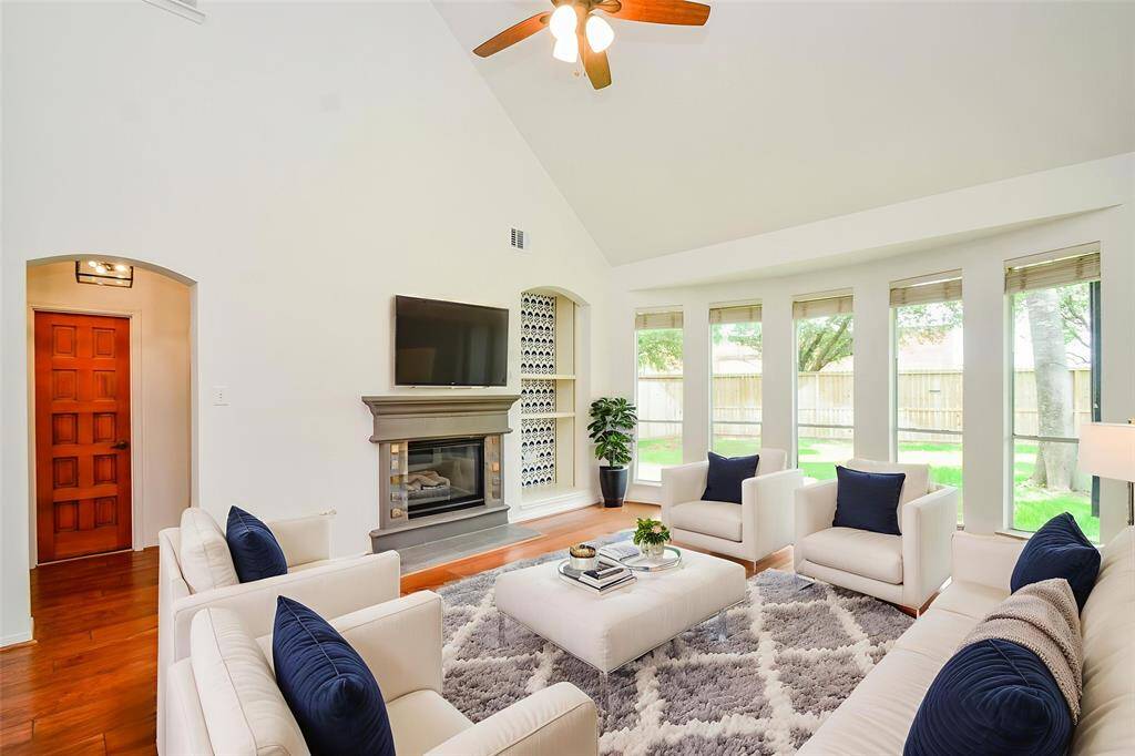 Virtually staged Family room.