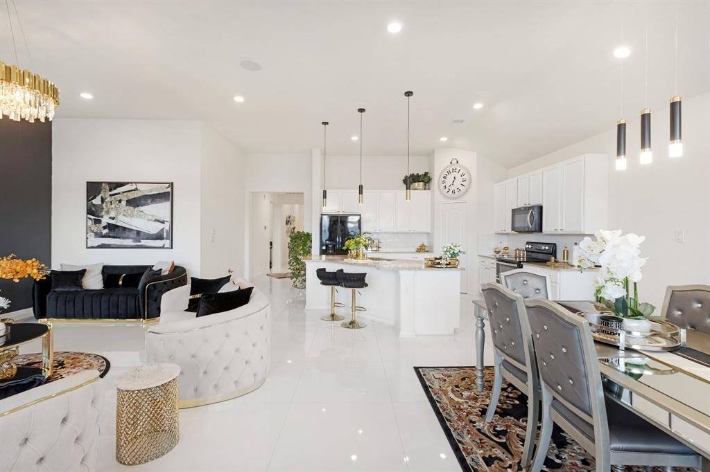 The kitchen and breakfast room are open to the living room!