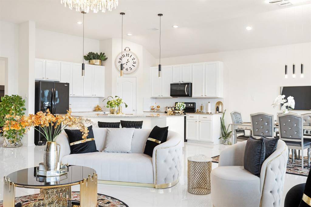 Another view of the bright andspacious living room.