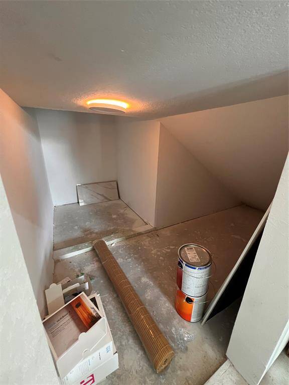 Storage underneath the stairs in garage