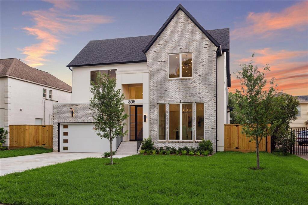 [FRONT ELEVATION] Welcome to 806 Holton.. Striking French contemporary elevation showcases a harmonious blend of brick and smooth stucco, exuding timeless elegance with a modern edge.
