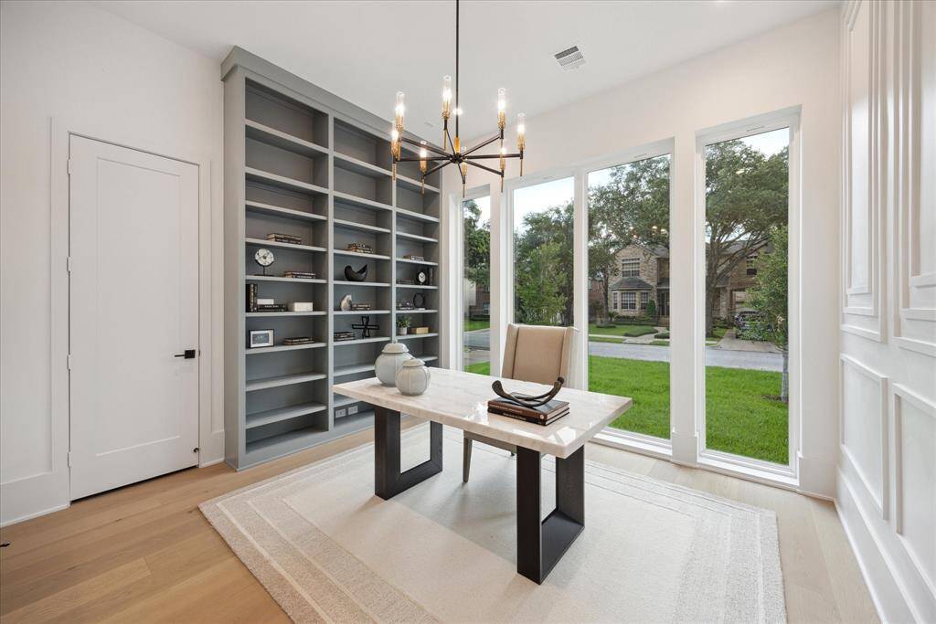 [STUDY/HOME OFFICE] Sophisticated and serene, the dedicated study offers the perfect balance of function and style. Framed by elegant architectural details and generous natural light, this refined space is ideal for working from home, reading, or quiet reflection