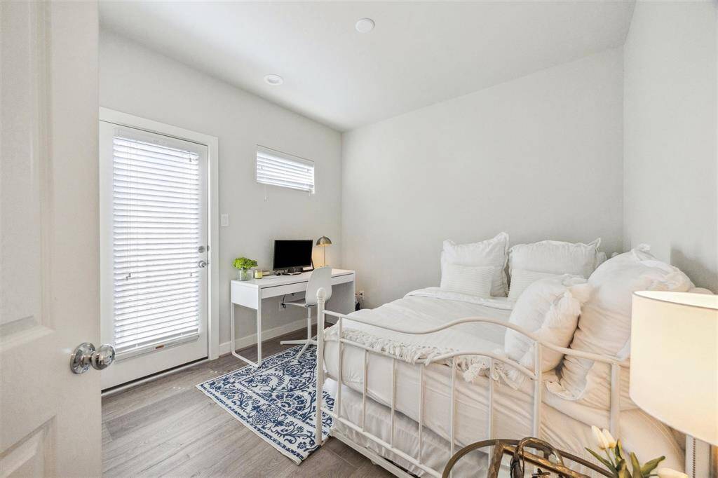First floor secondary bedroom with access to the backyard