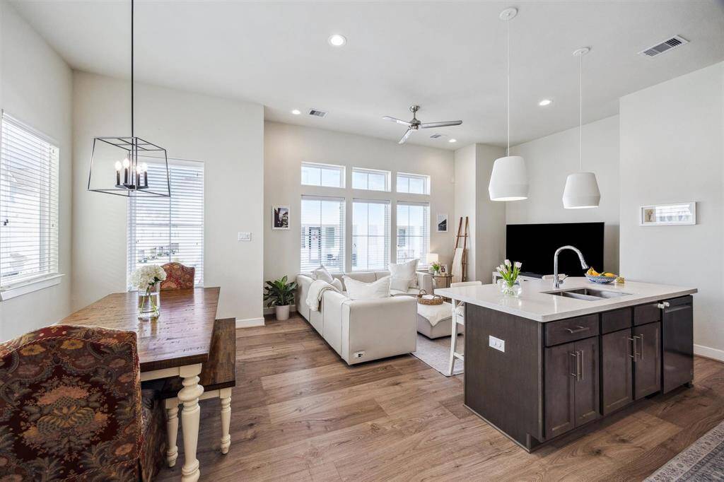 Second floor kitchen, dining and living rooms with plenty of natural light.