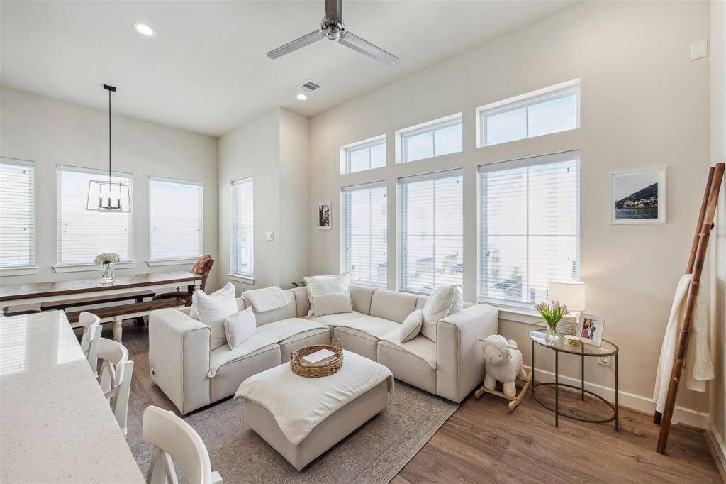 Open living room with wall to wall windows