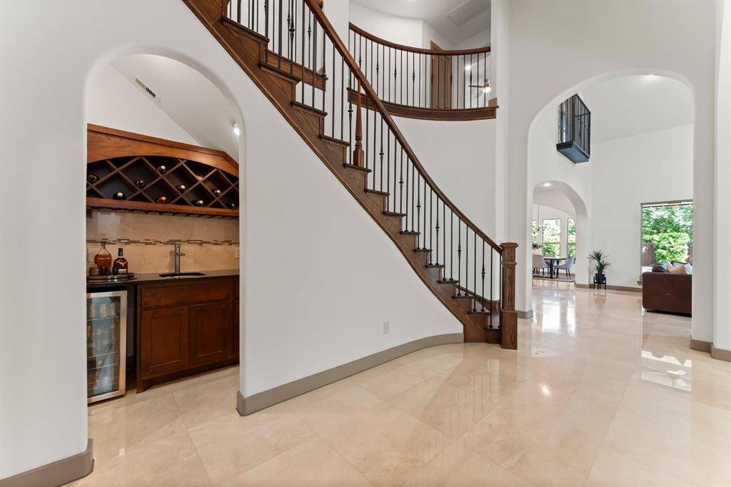 Wine Storage with Wet Bar and Beverage Refrigerator Makes Entertaining in the Dining Room Seemless