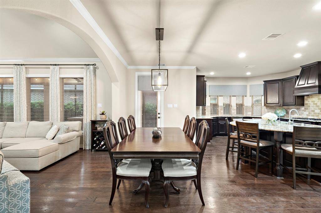 Just steps from the kitchen, this dining area enhances the home’s efficiency while offering a comfortable place to gather.