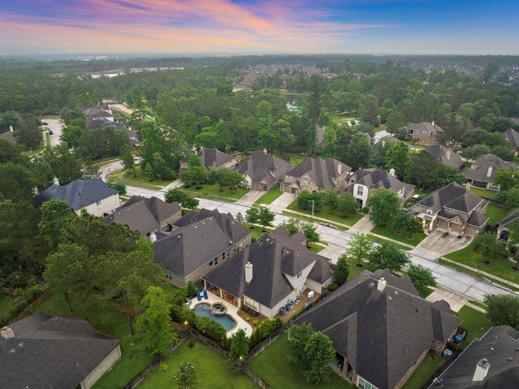 Nestled within Chestnut Ridge at Jacobs Reserve, this home enjoys a rare balance of tranquility and access, positioned near Houston and both airports while offering the comfort of an upscale enclave.