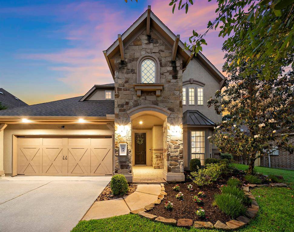 A thoughtfully designed exterior with stone accents and manicured landscaping welcomes you home, while the oversized 3-car garage offers epoxy floors and built-in storage to keep everything organized.