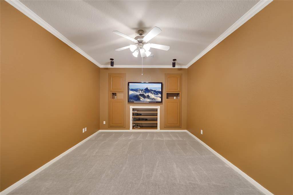 Upstairs media room with surround sound wiring & TV stays!