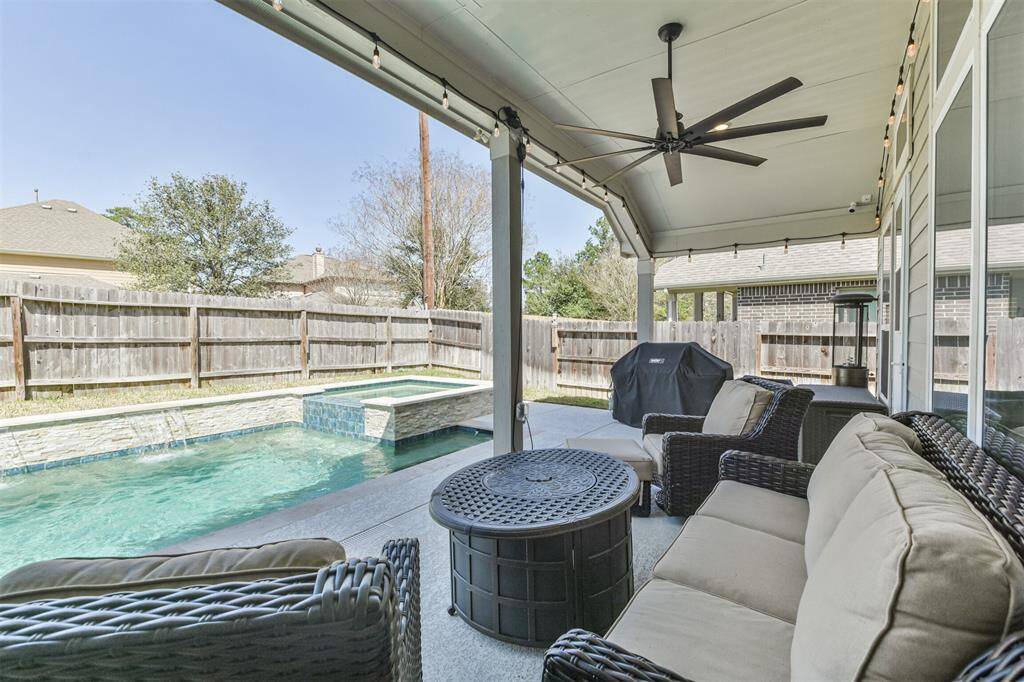 Private backyard, modern rectangle pool, and spa. Perfect for relaxation and entertaining.