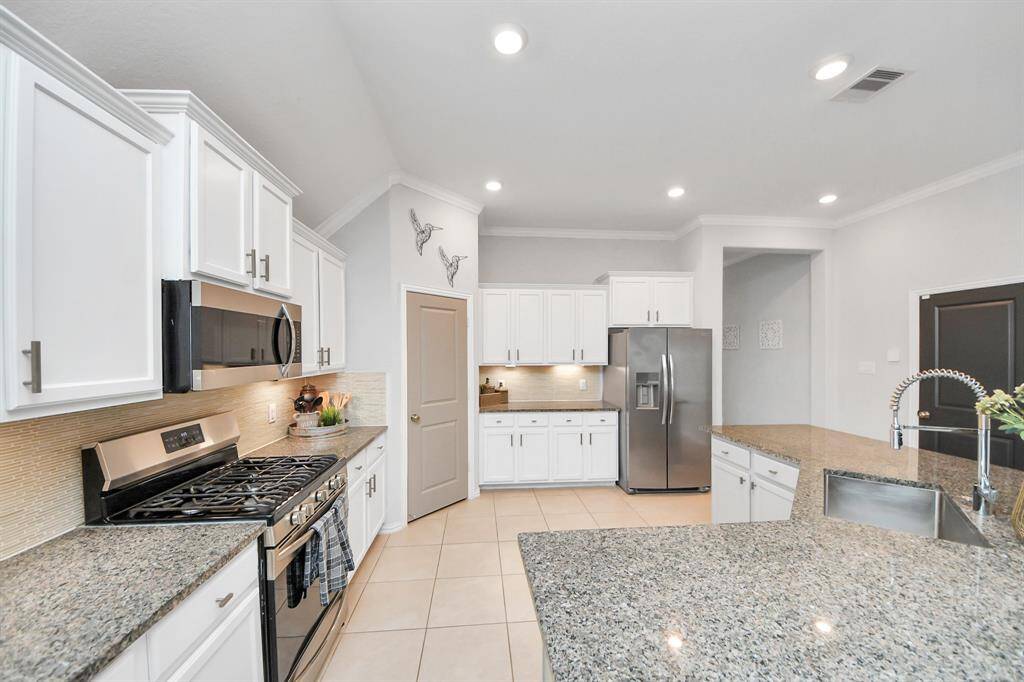 Huge granite island with seating up to six!